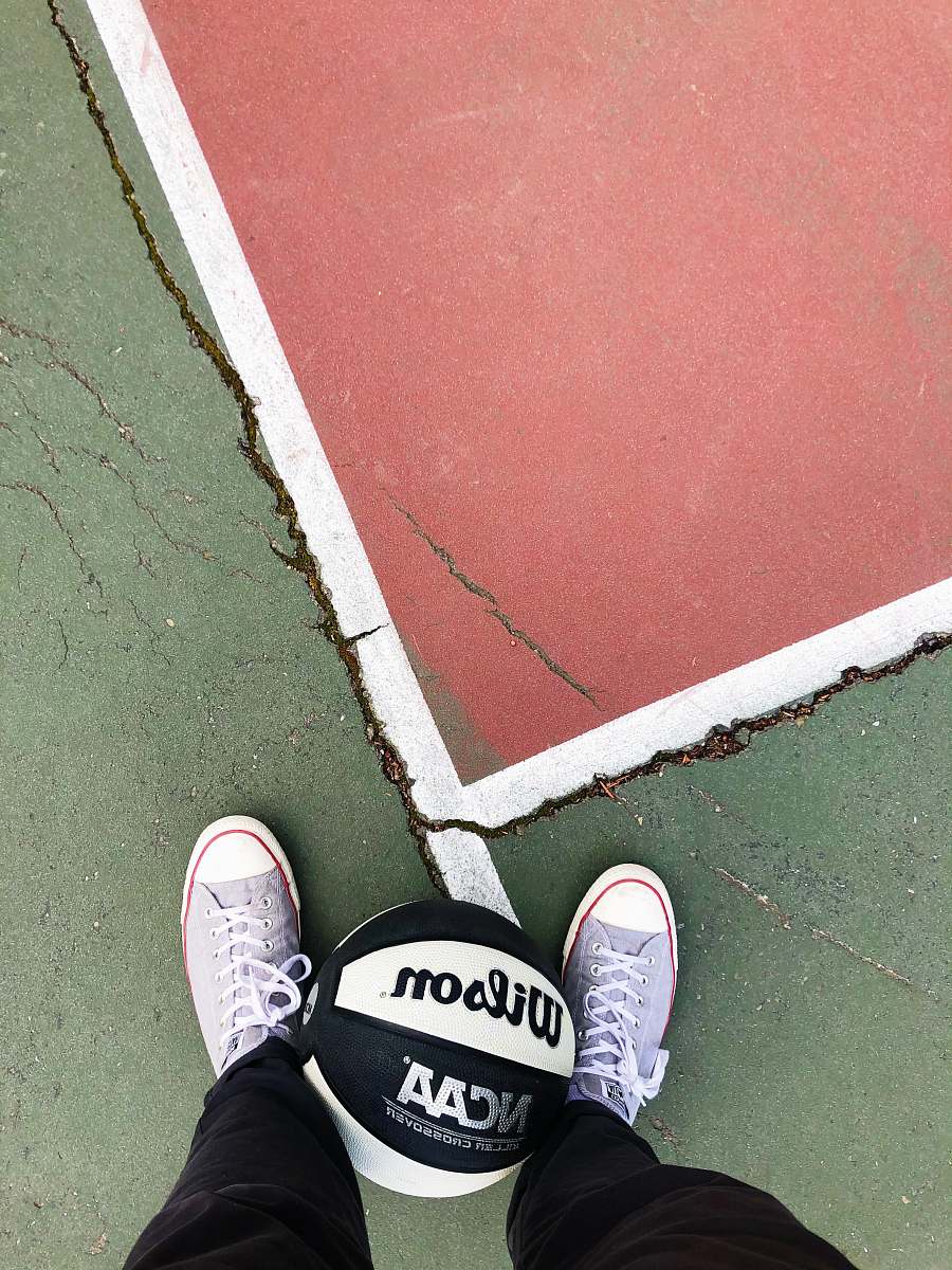 clothing person wearing black and white converse all star sneakers footwear