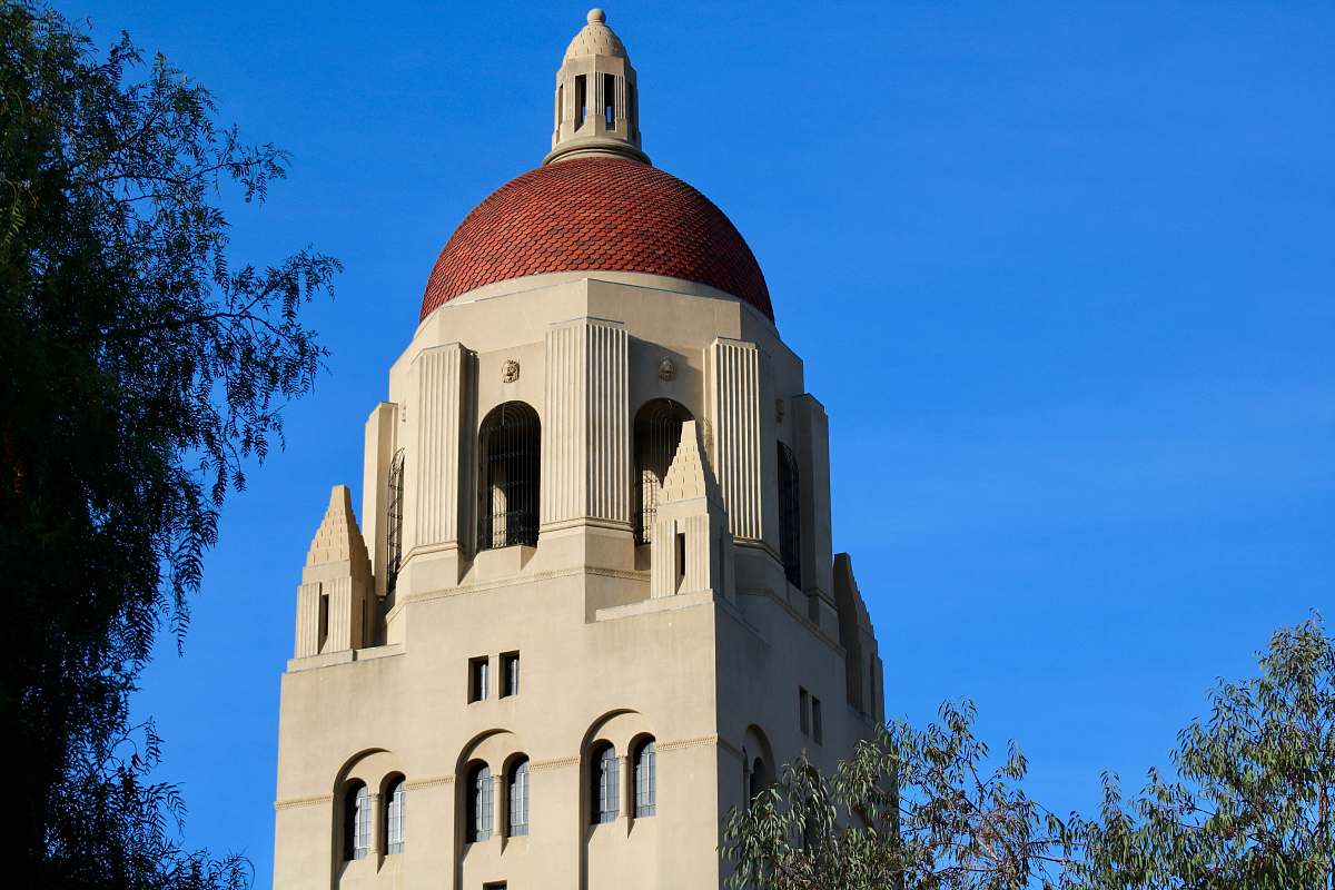 building architectural photo of a beige and brown building tower