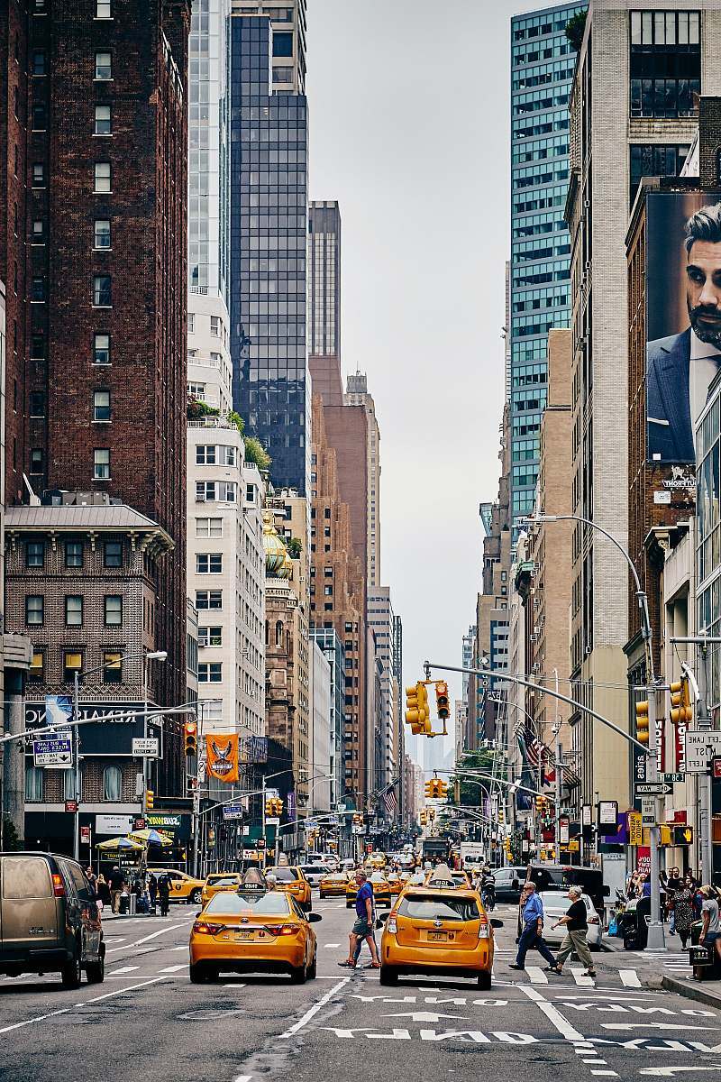 cab person crossing pedestrian lane car