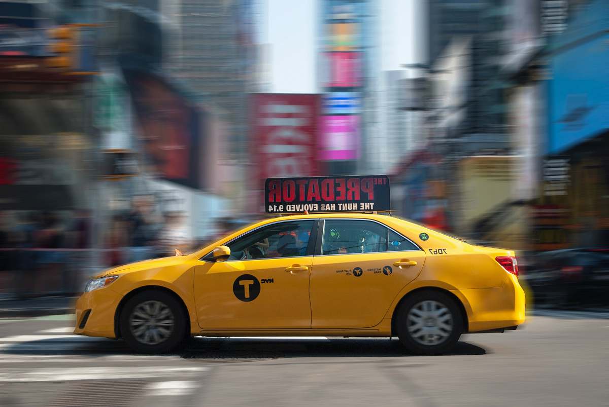 car yellow sedan cab
