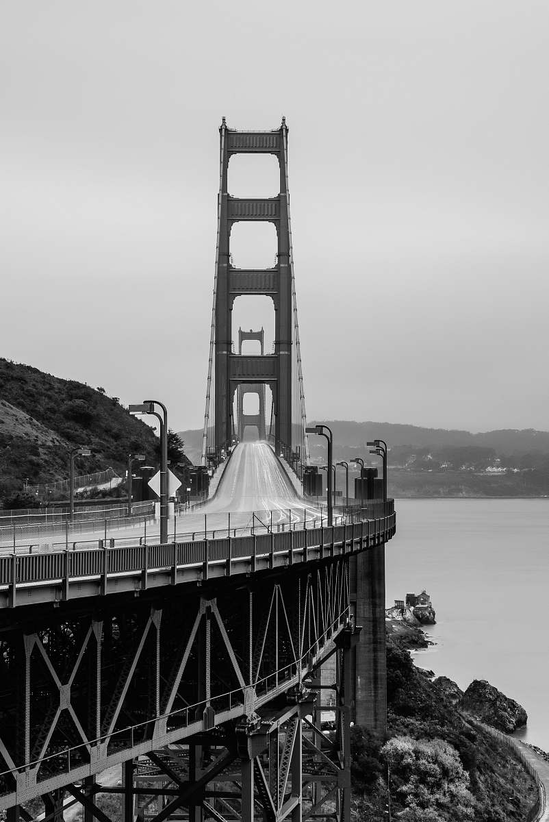 building grascale photography of cable bridge bridge