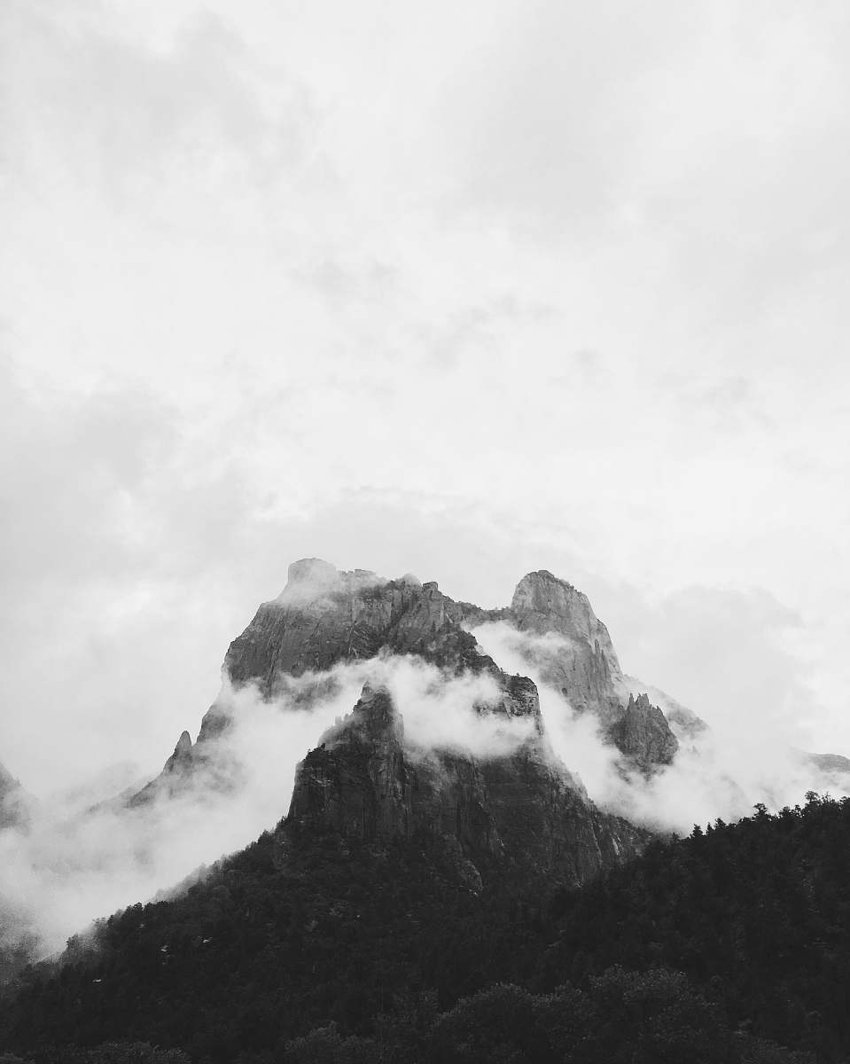 mountain mountain under white cloud during daytime grey