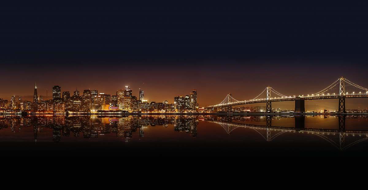building cityscape photography of lighted city with bridge city
