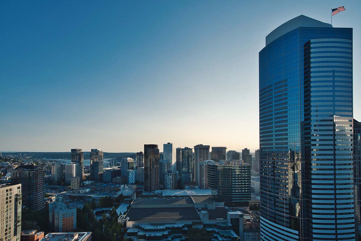 city aerial photography of buildings under blue sky urban