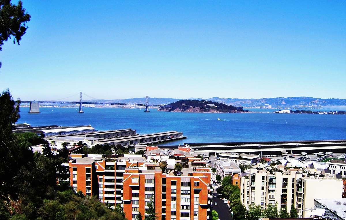 city bird's eye view photo of orange high rise building san francisco