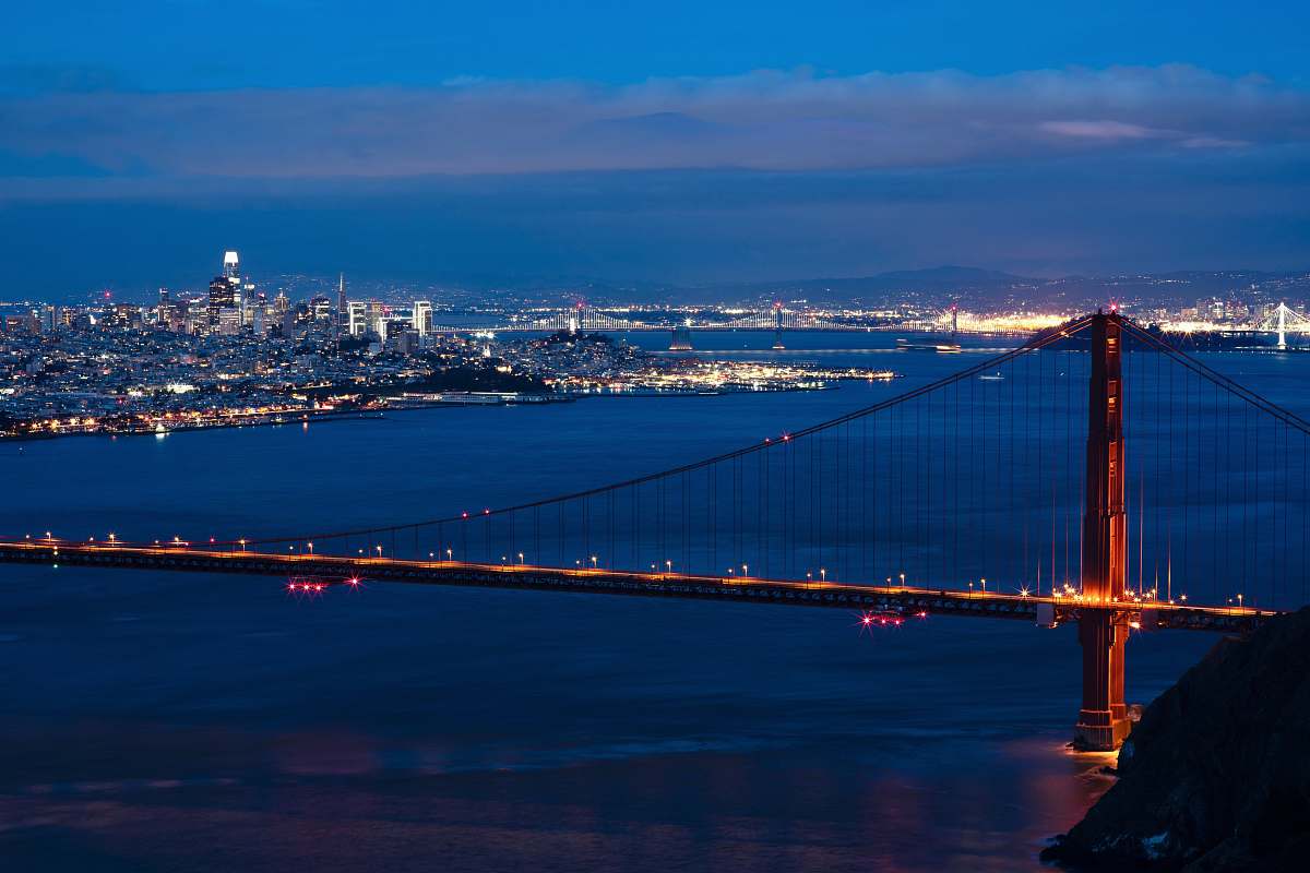 nature bridge, sea, and city during night landscape