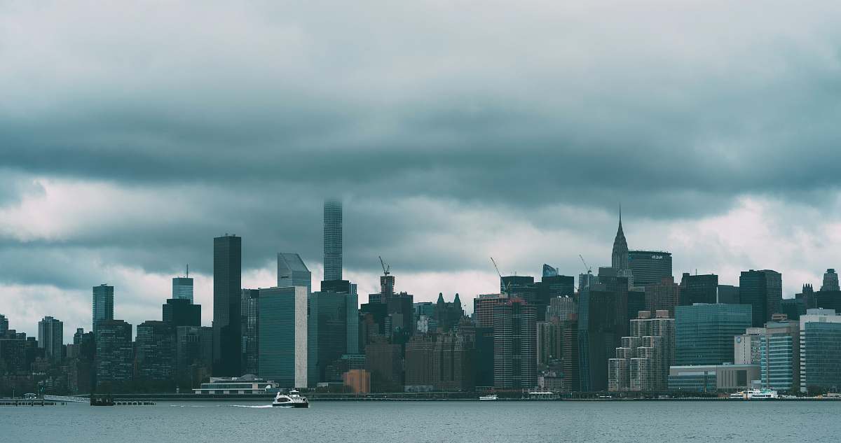 city cityscape photography under nimbus clouds urban