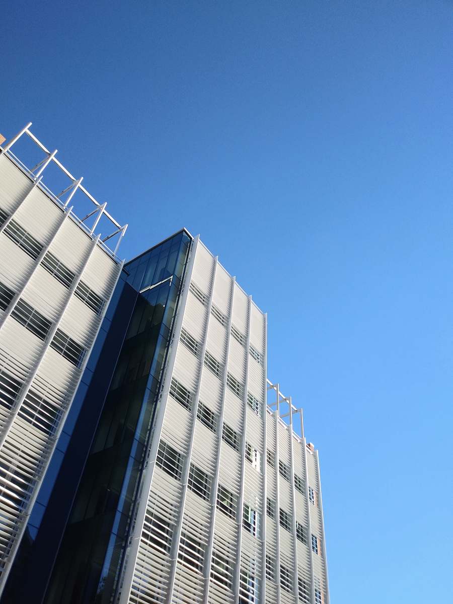 housing low angle photography of white highrise building screenshot architecture