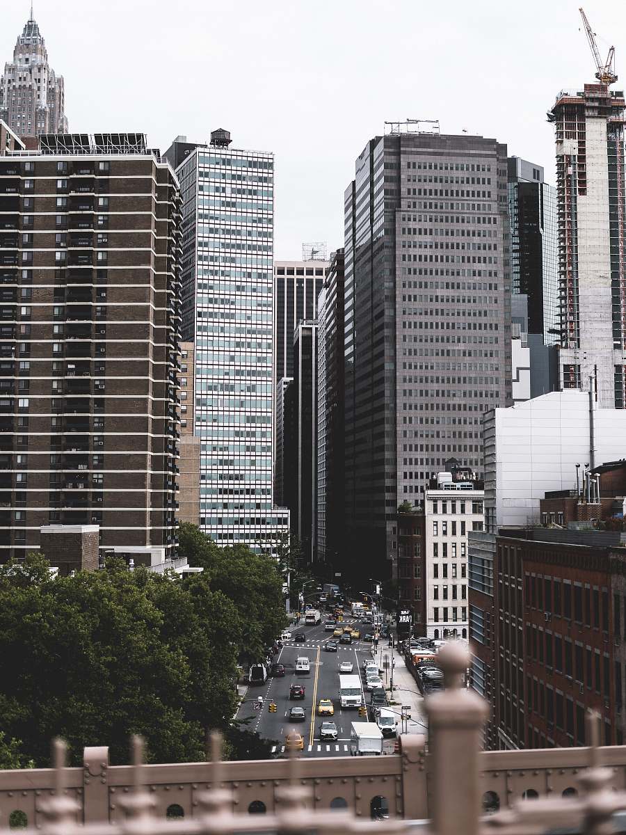 urban photo of brown and white high rise buildings during daytime brooklyn bridge