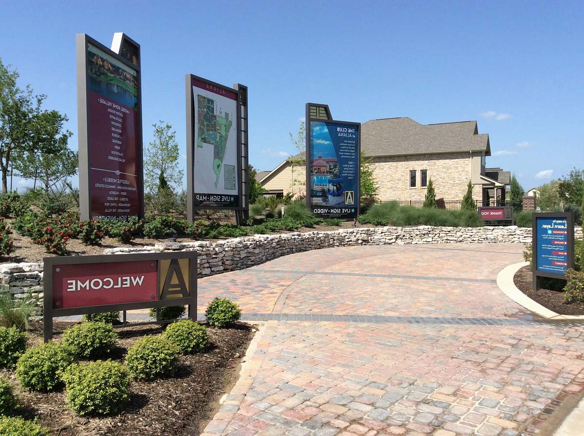 flagstone Welcome signage path