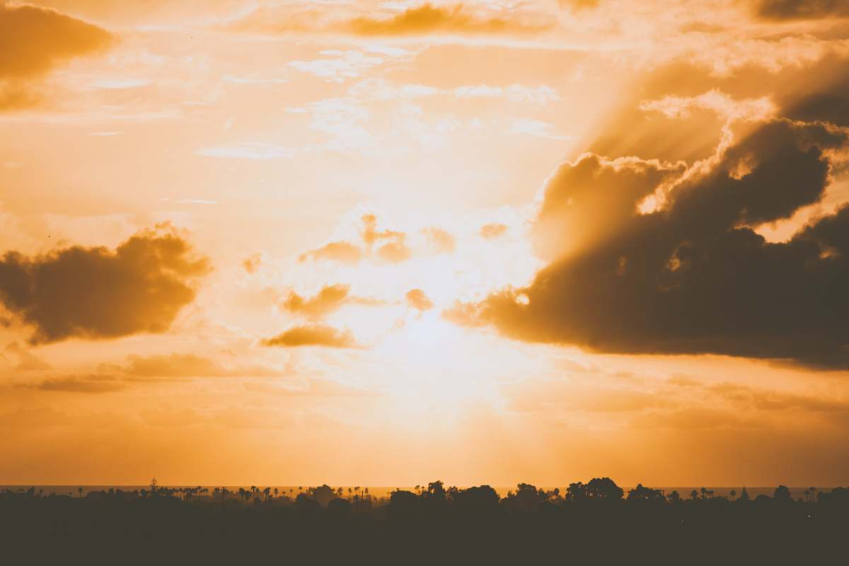 sunset photo of clouds covering the sun sunlight