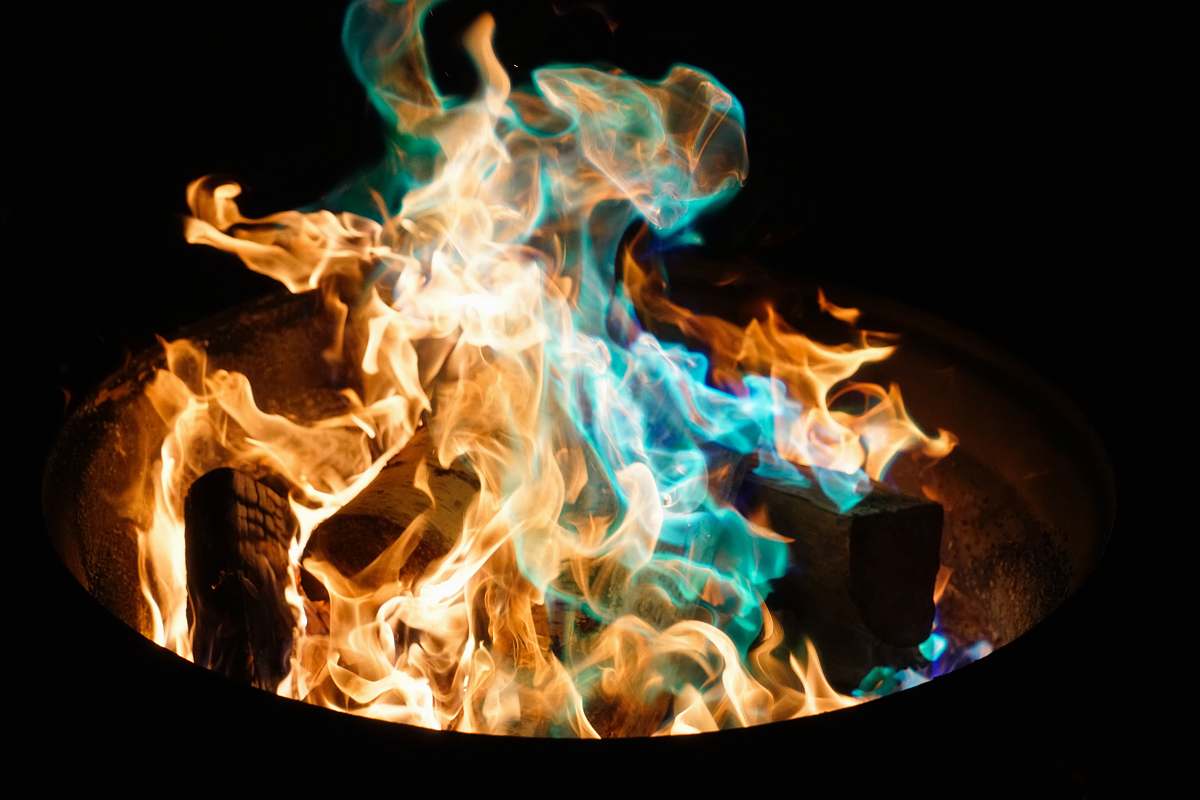 flame orange and blue flame on pile of wood broomall
