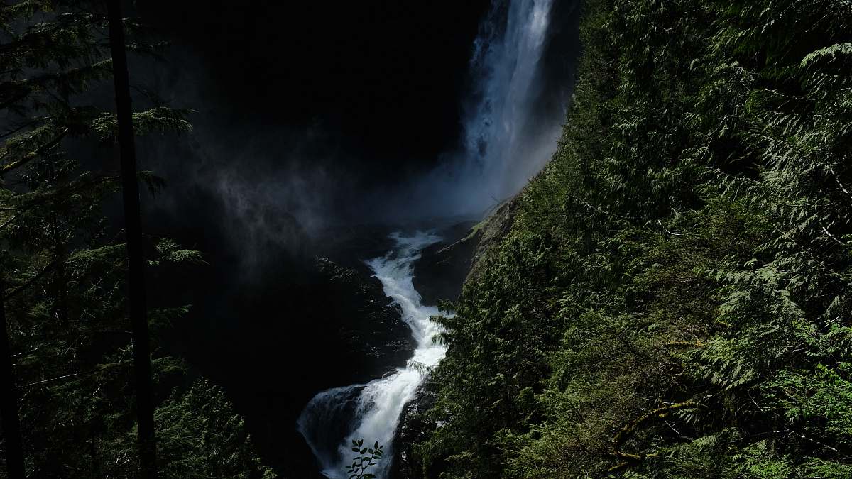 nature waterfall between mountain waterfall
