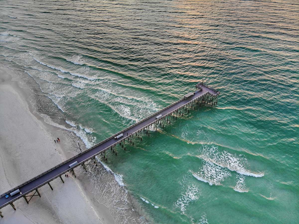 ocean people under black bridge panama city beach