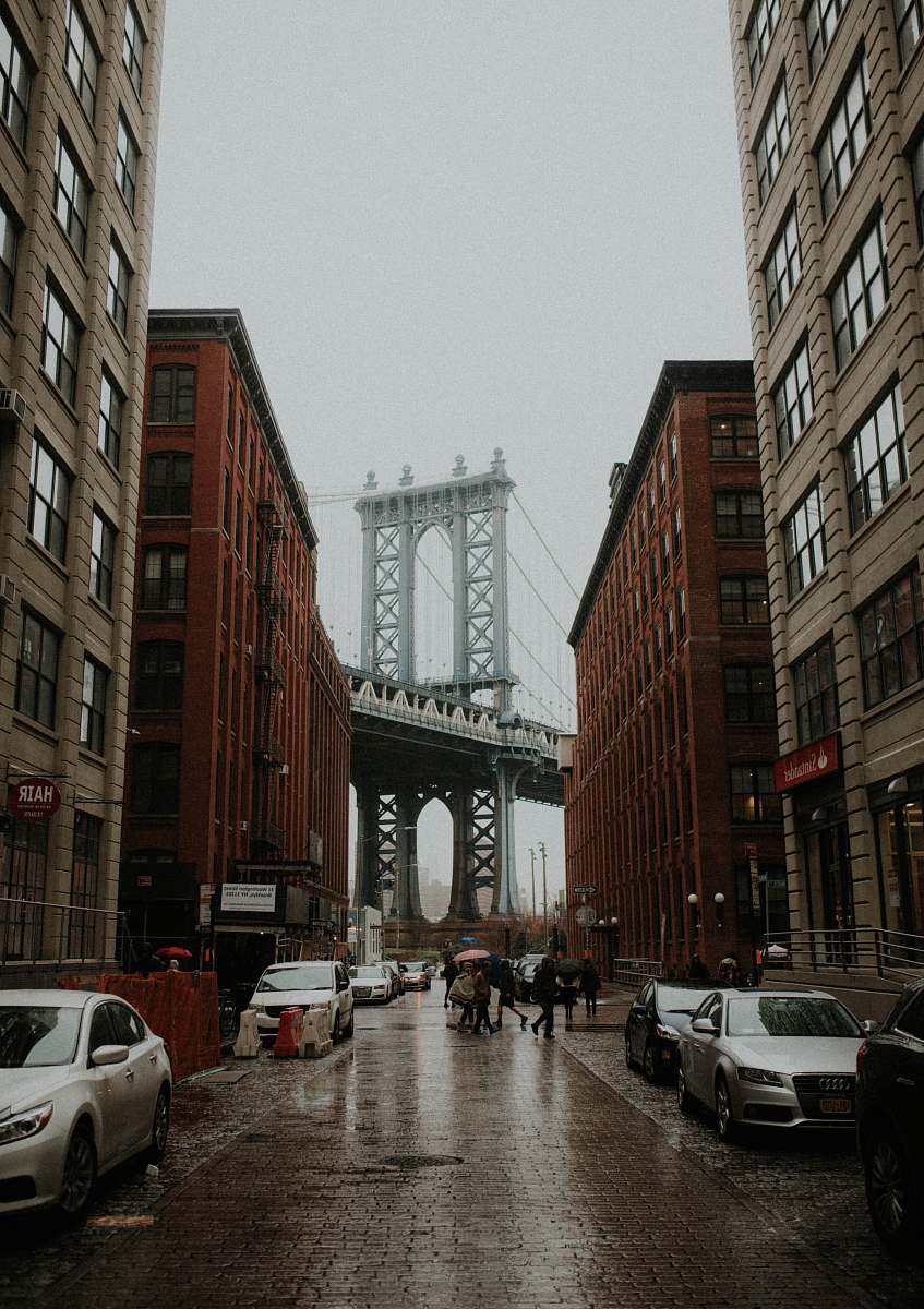 brooklyn photo of high rise building and a bridge as background new york city
