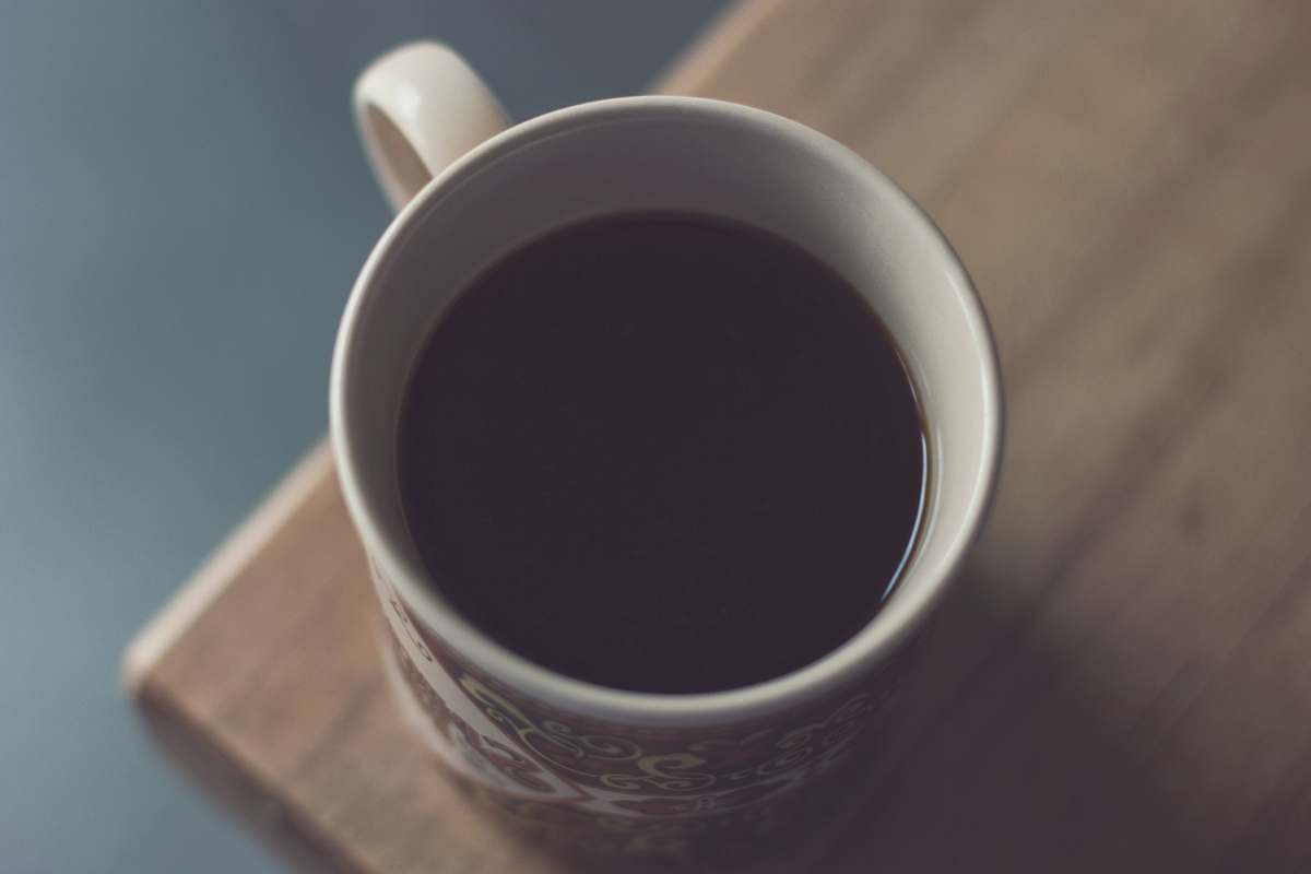 cup white and black ceramic mug coffee cup