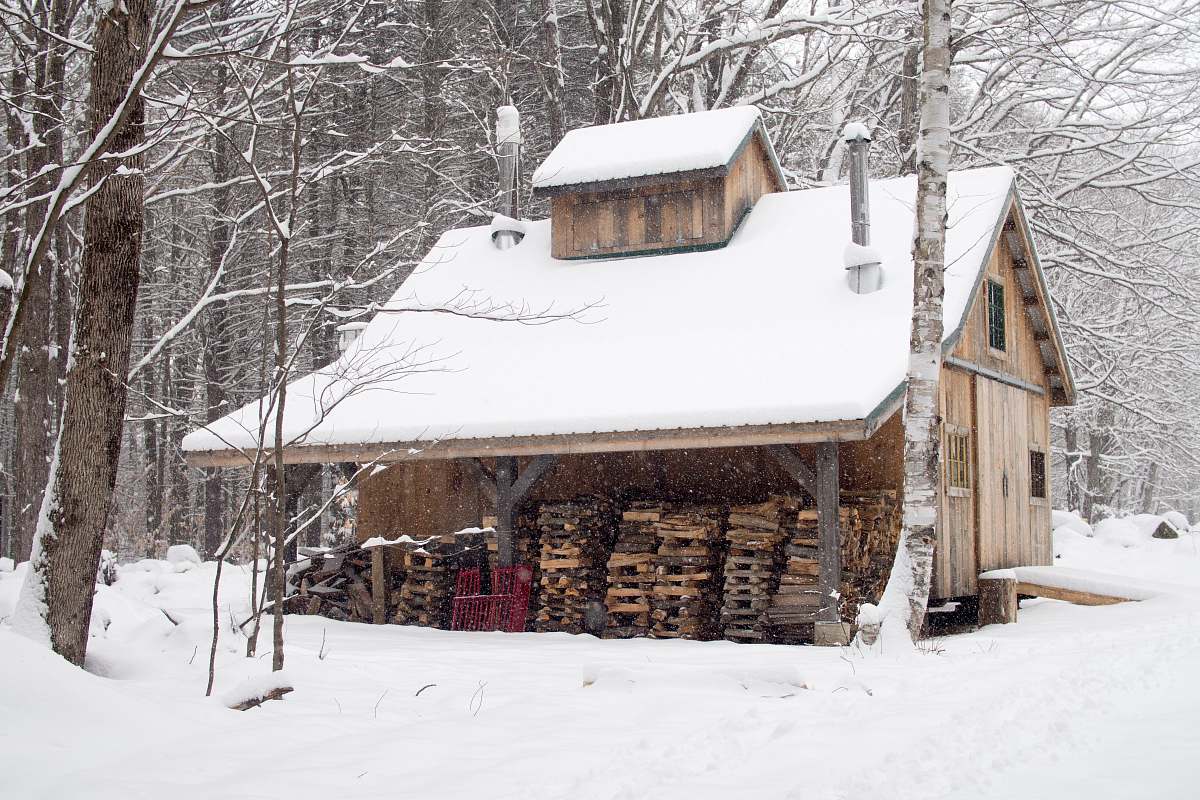 snow photo of house covered with snow in front of trees lebanon