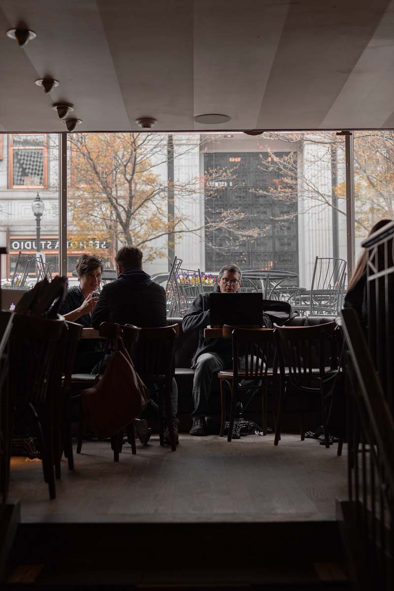 restaurant man sitting near the window photography cafe