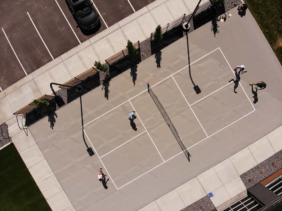 person people playing sports game road