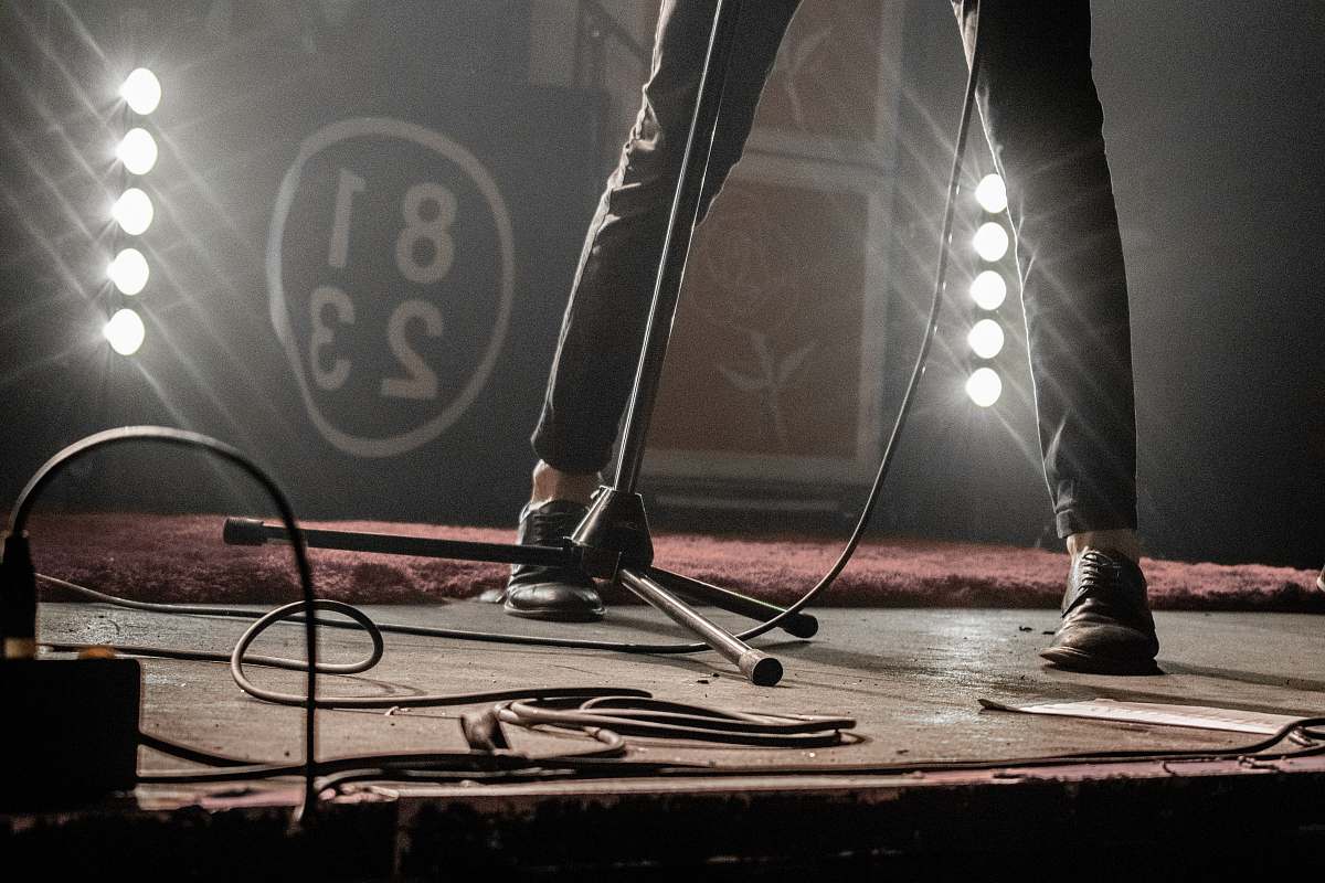 person person standing on stage footwear