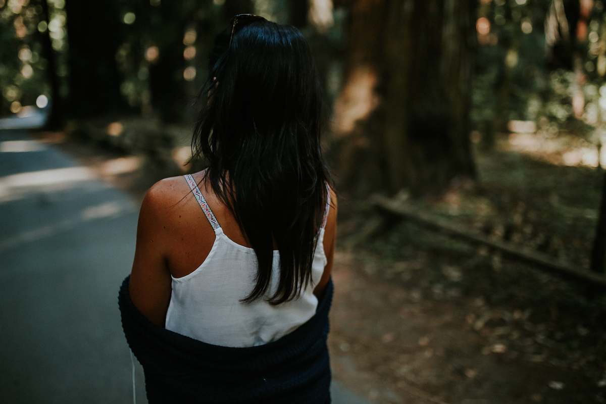 person woman wearing white tank top with black blazer people