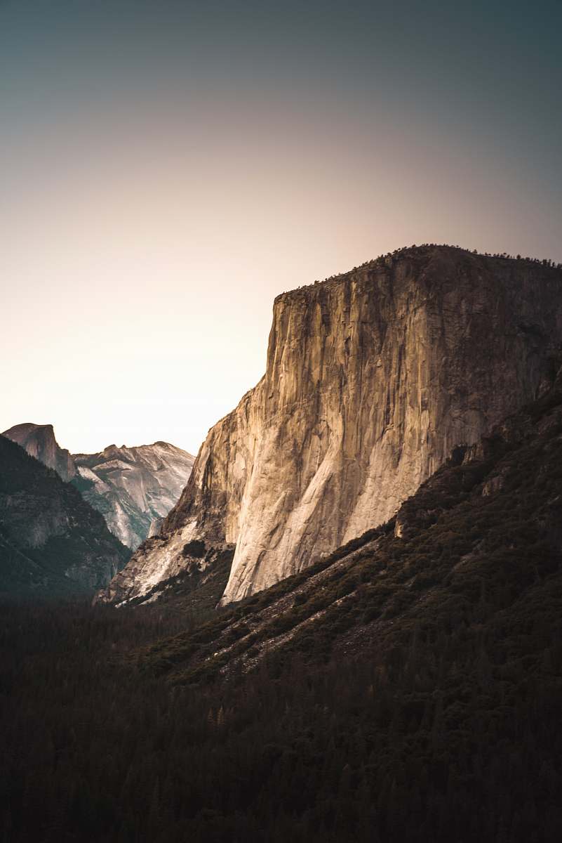 outdoors landscape of mountain near trees cliff
