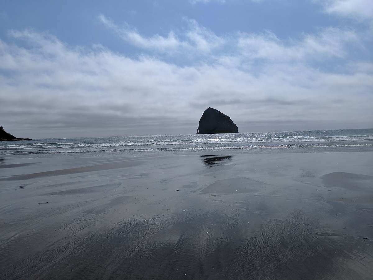 ocean black coastal stack during daytime outdoors