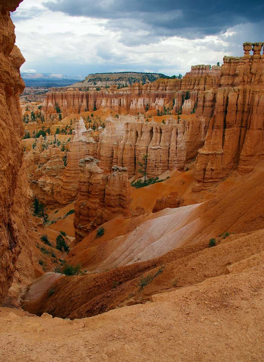 canyon high rise mountain under cloudy sky at daytime mountain