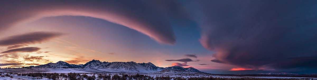 outdoors mountain range during golden hour panoramic