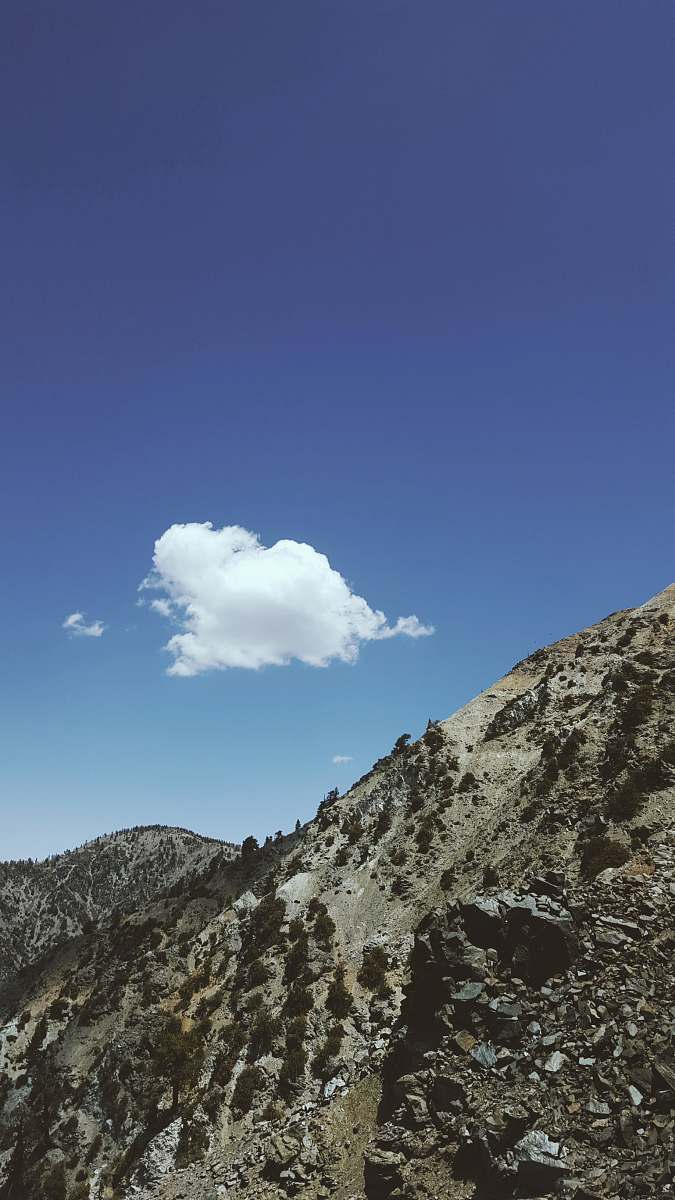 outdoors mountains under clouds mountain