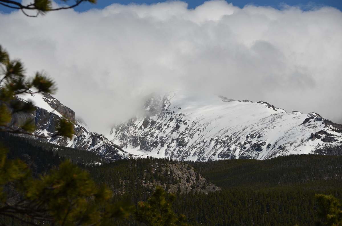 outdoors overlooking forest and mountains mountain range