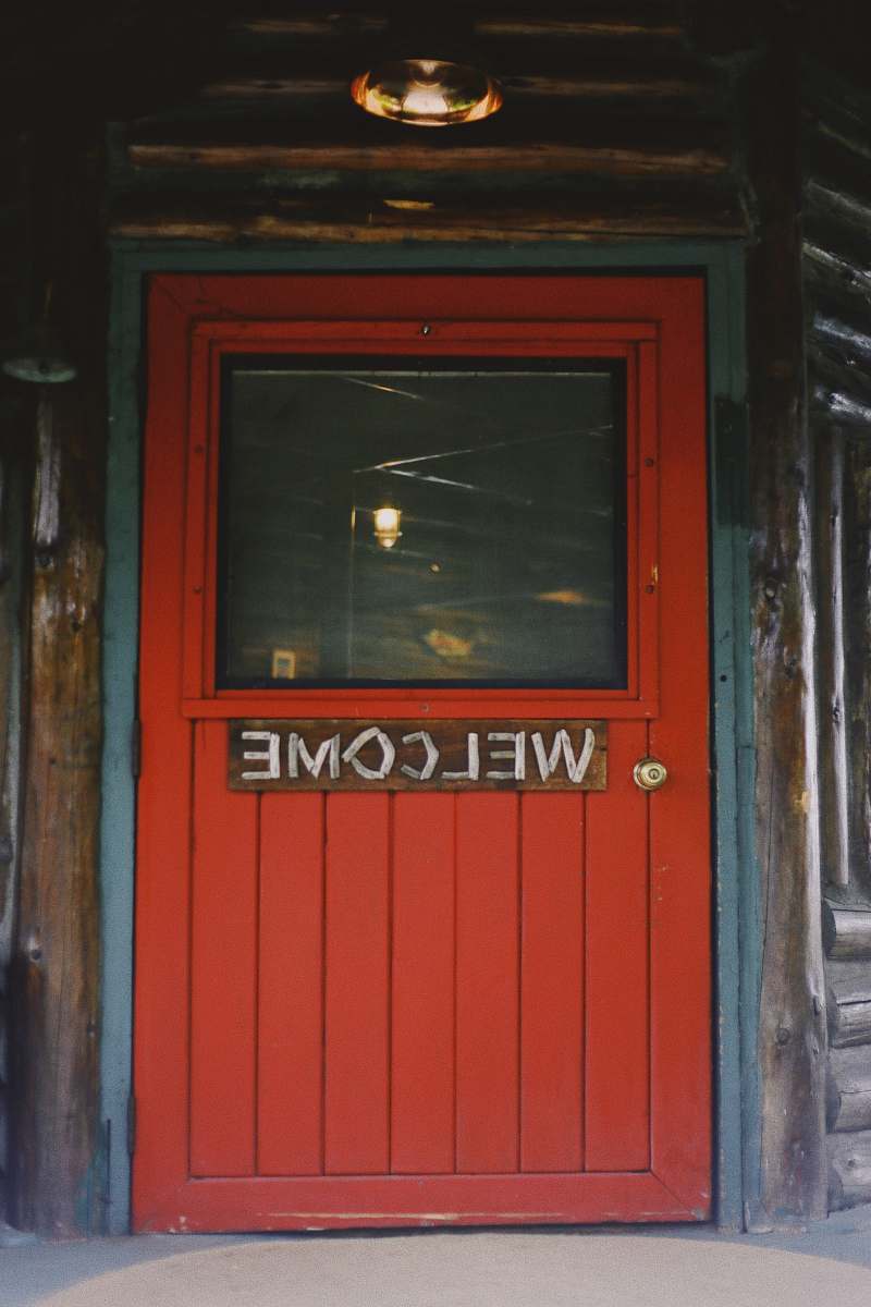 outdoors red wooden closed door door