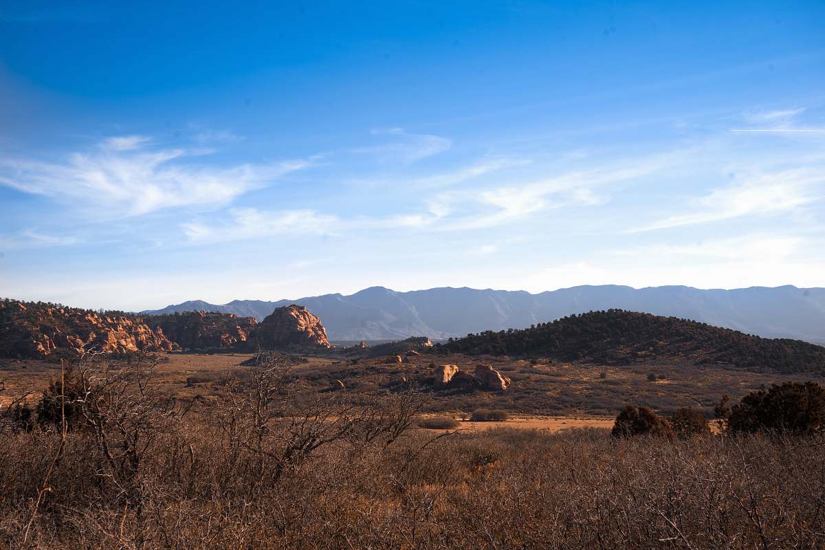 nature brown mountains under blue sky during daytime plateau