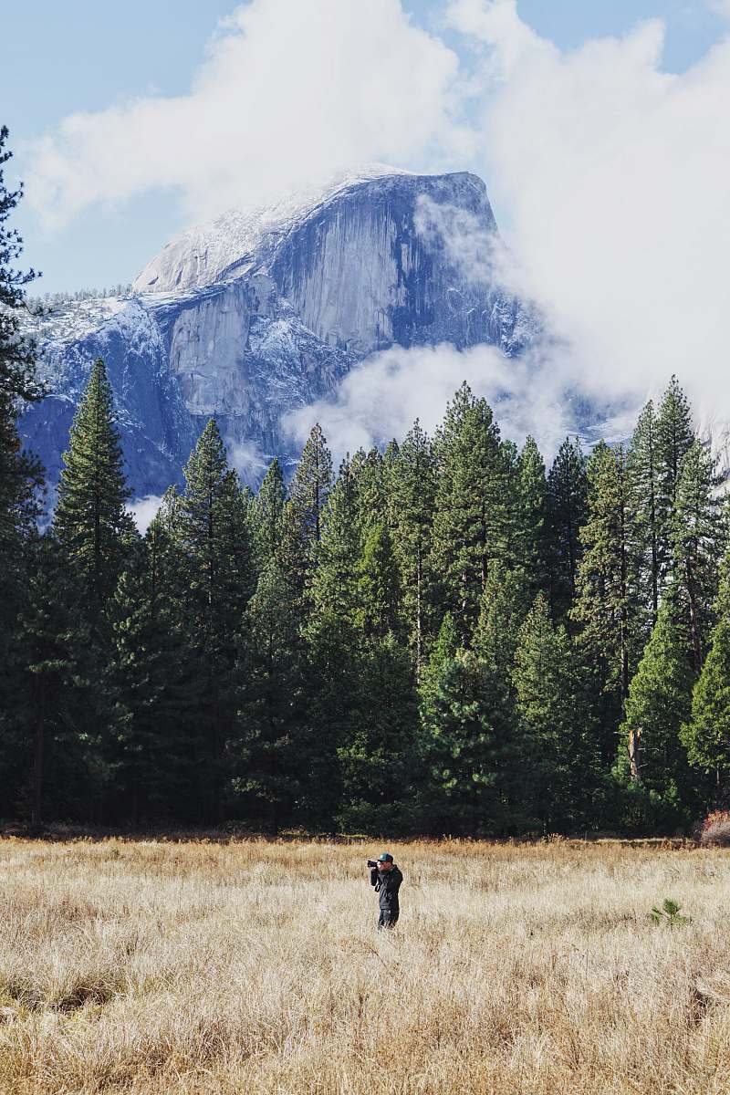 field man taking photo on firld half dome