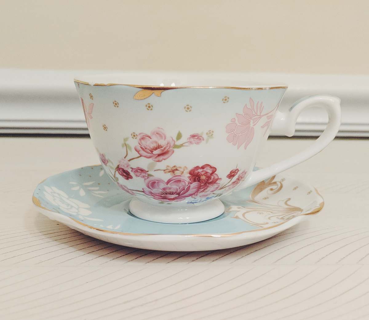 pottery white and pink floral ceramic teacup and saucer coffee cup