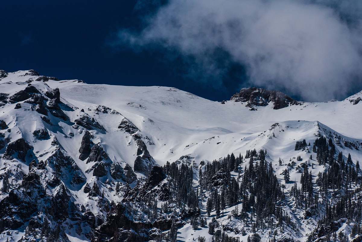 mountain bird's eye view of mountains and trees coated with snow nature