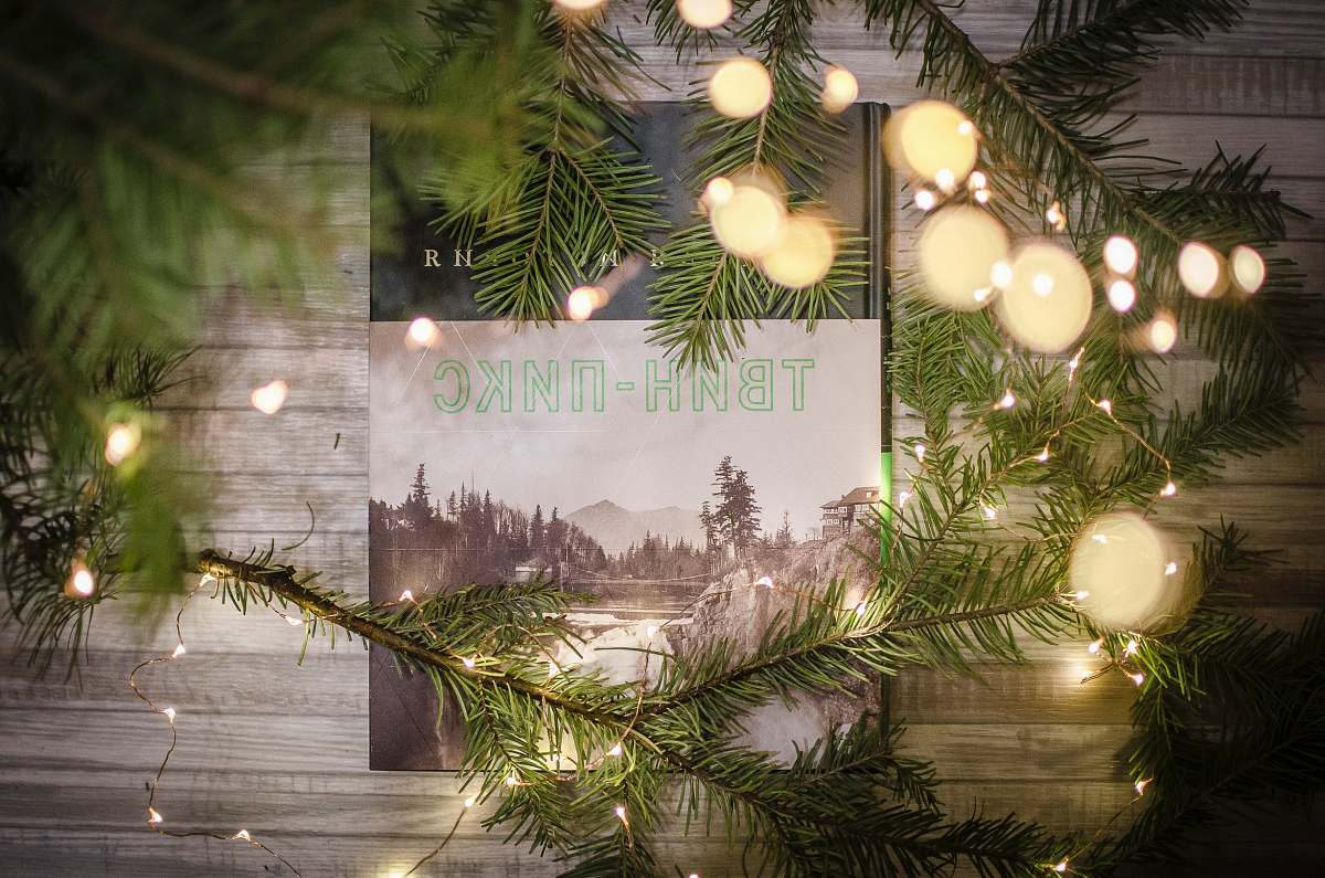 ornament photo on wall behind green trees snoqualmie falls