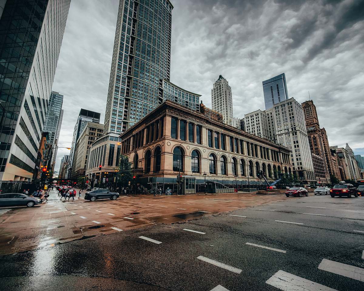 downtown road between buildings during daytime road