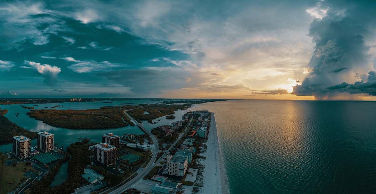 building aerial view of establishments near body of water ocean
