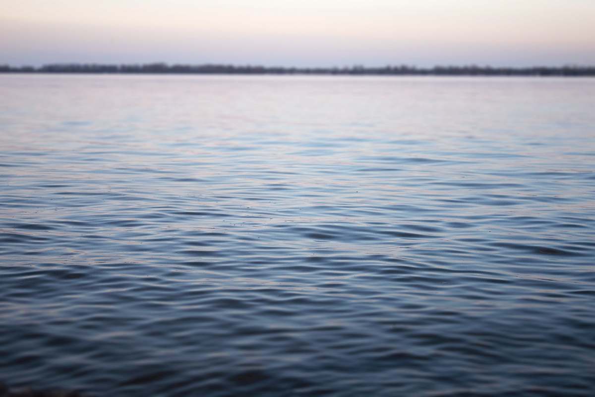outdoors body of water under white sky during daytime nature