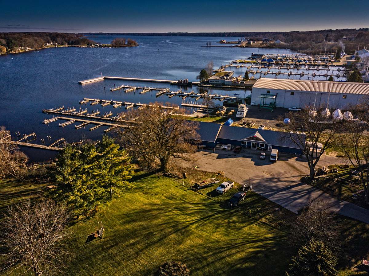 coast aerial photography of dock during daytime ocean