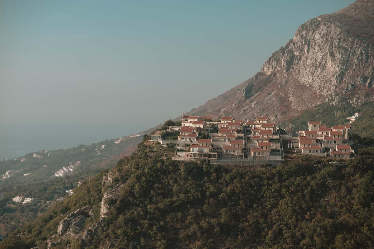 building aerial photo of houses on mountain during daytime housing