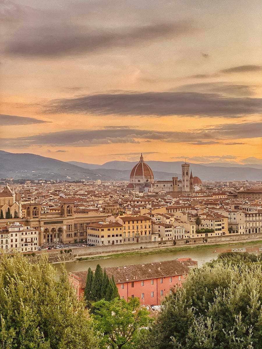 building aerial photography of Florence, Italy under white and orange sky during daytime dome