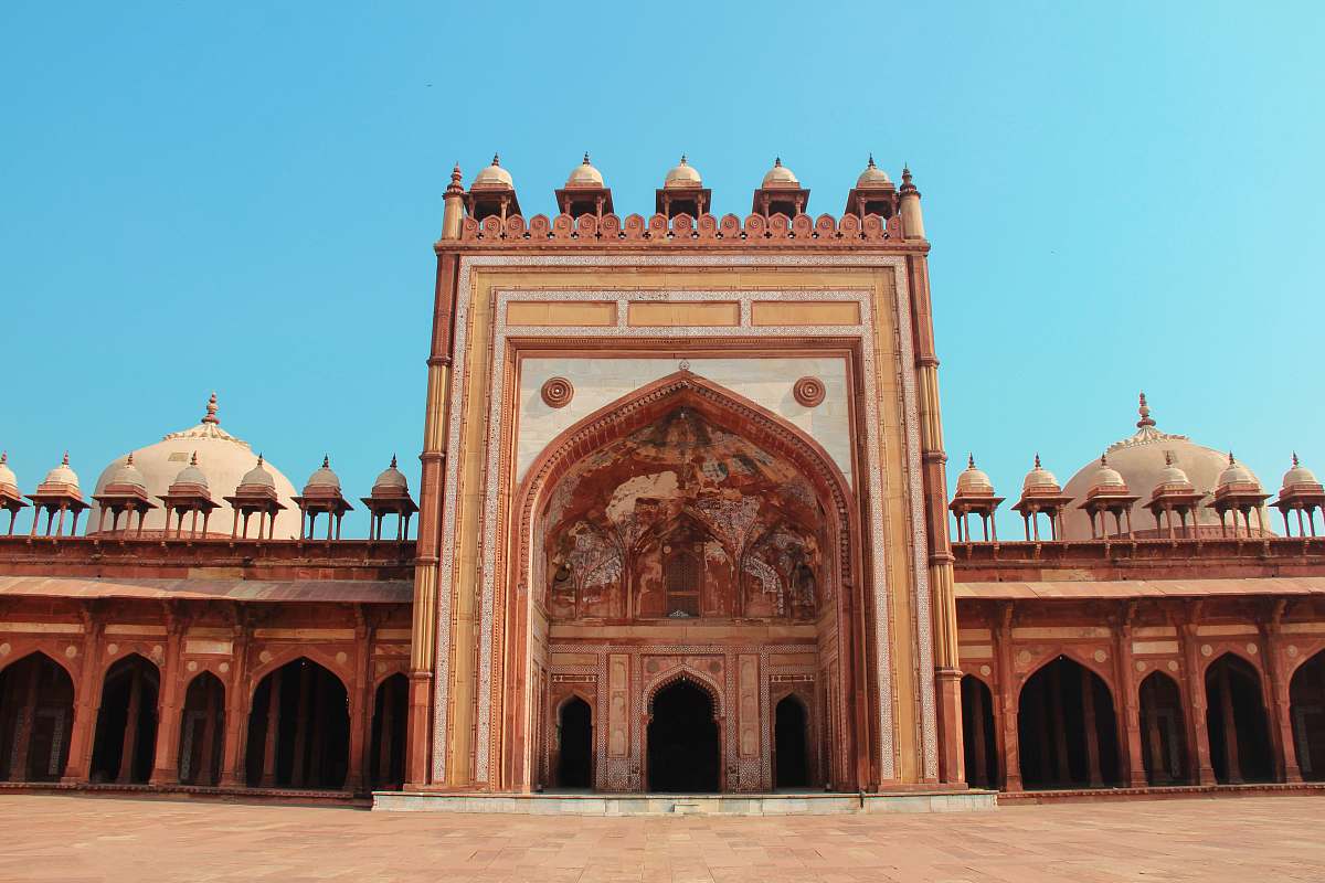 building architectural photography of brown and white temple dome
