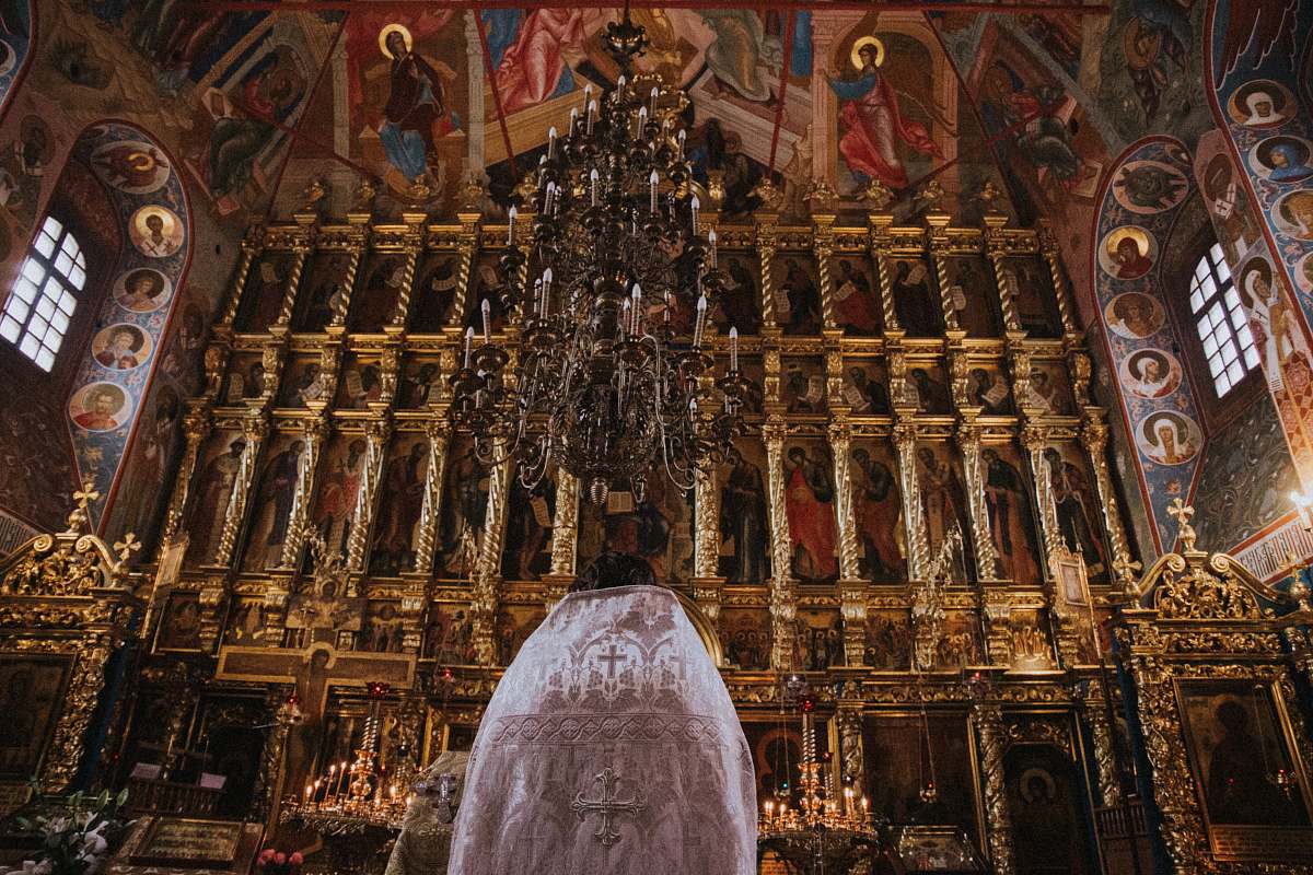 church architectural photography of brown building altar