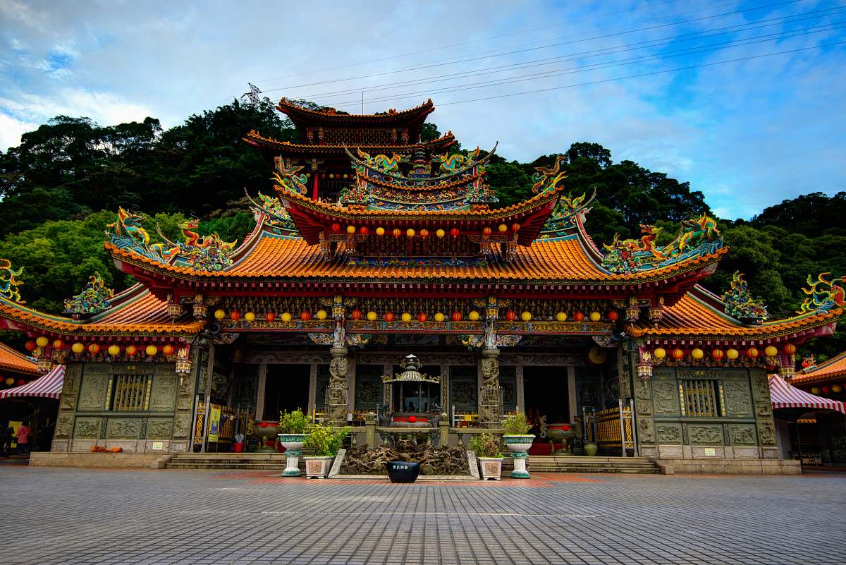 building architectural photography of brown house temple