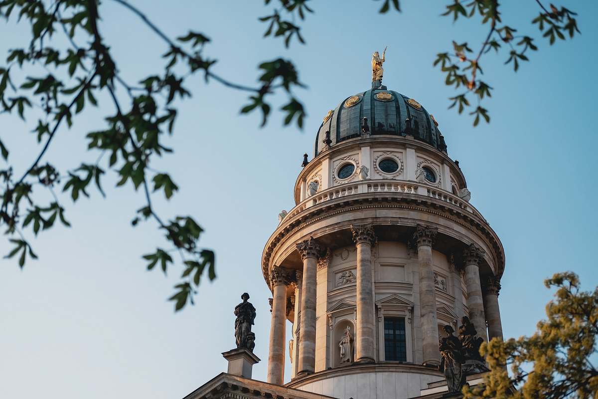 building beige and green domed building dome