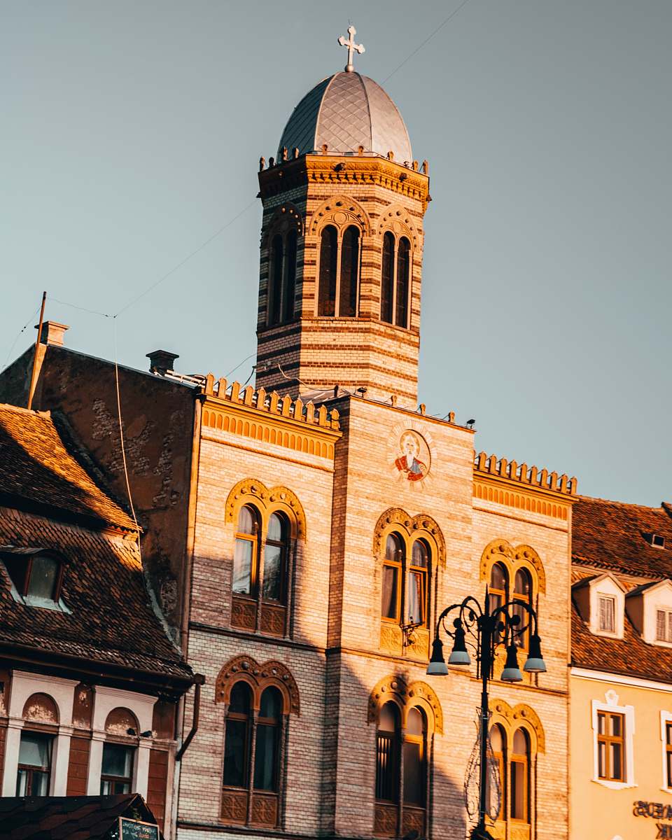 building beige and yellow bricked building tower