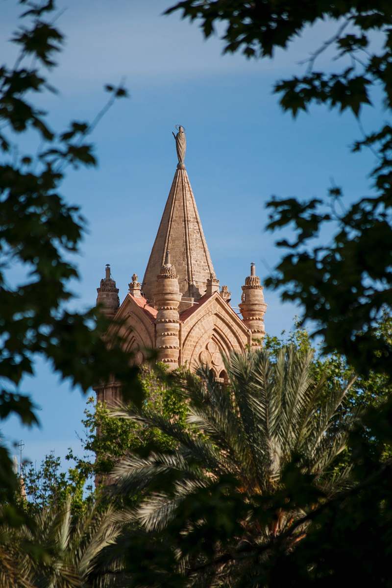tower beige building during day steeple