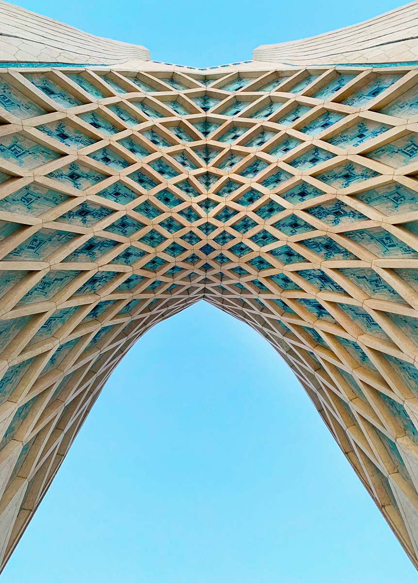 building beige high-rise building low angle photography arched